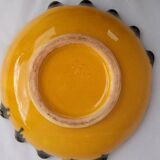 Multicolored earthenware dish signed Yvon Roy