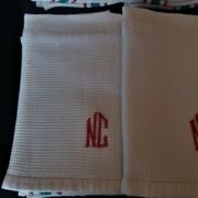 Set of ten antique cotton honeycomb towels hand-embroidered figure