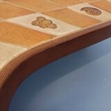 Barrois vintage shell-patterned comma coffee table in wood and ceramic.