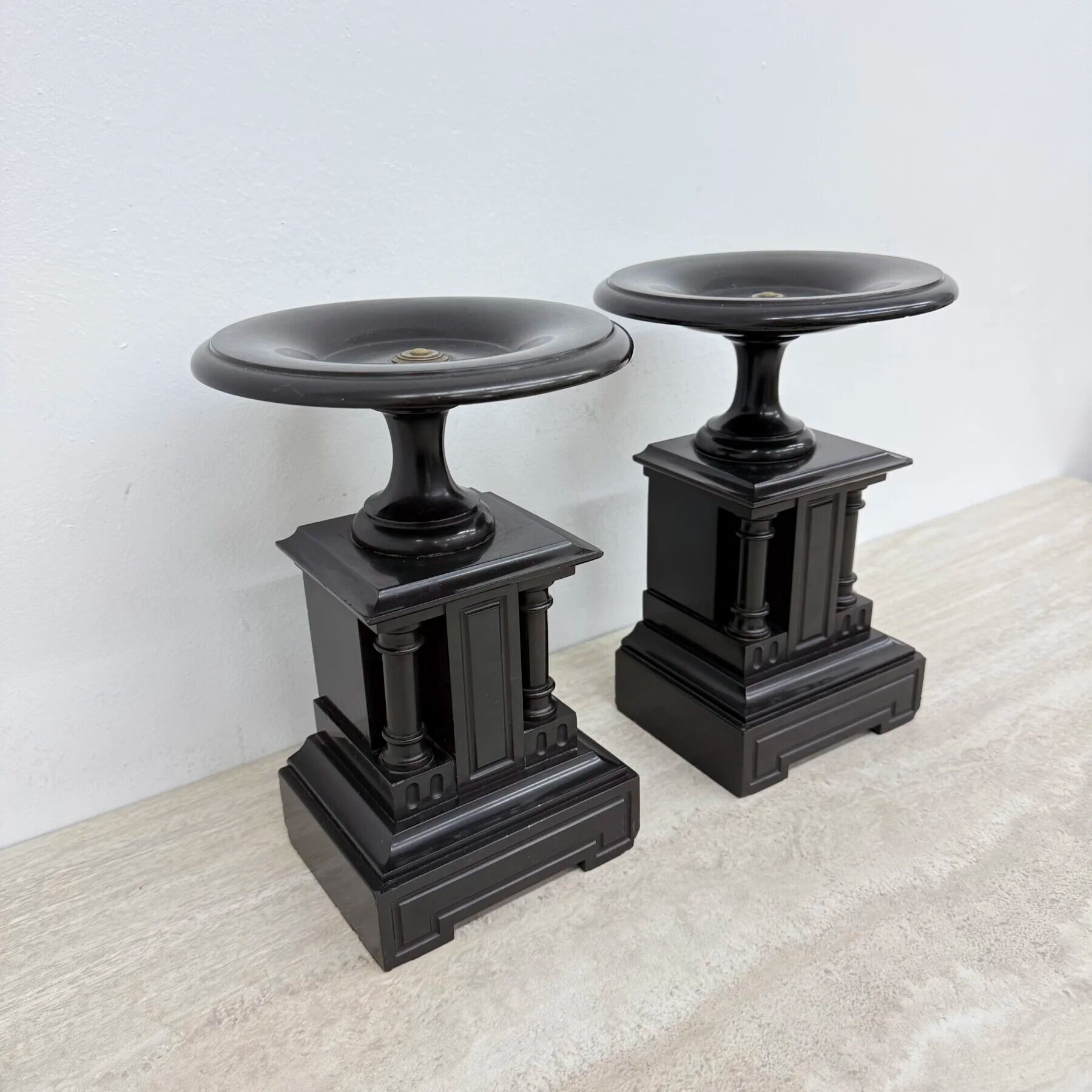 Antique French black marble cassoulets gilt decor pedestals neoclassical pair, 1900s