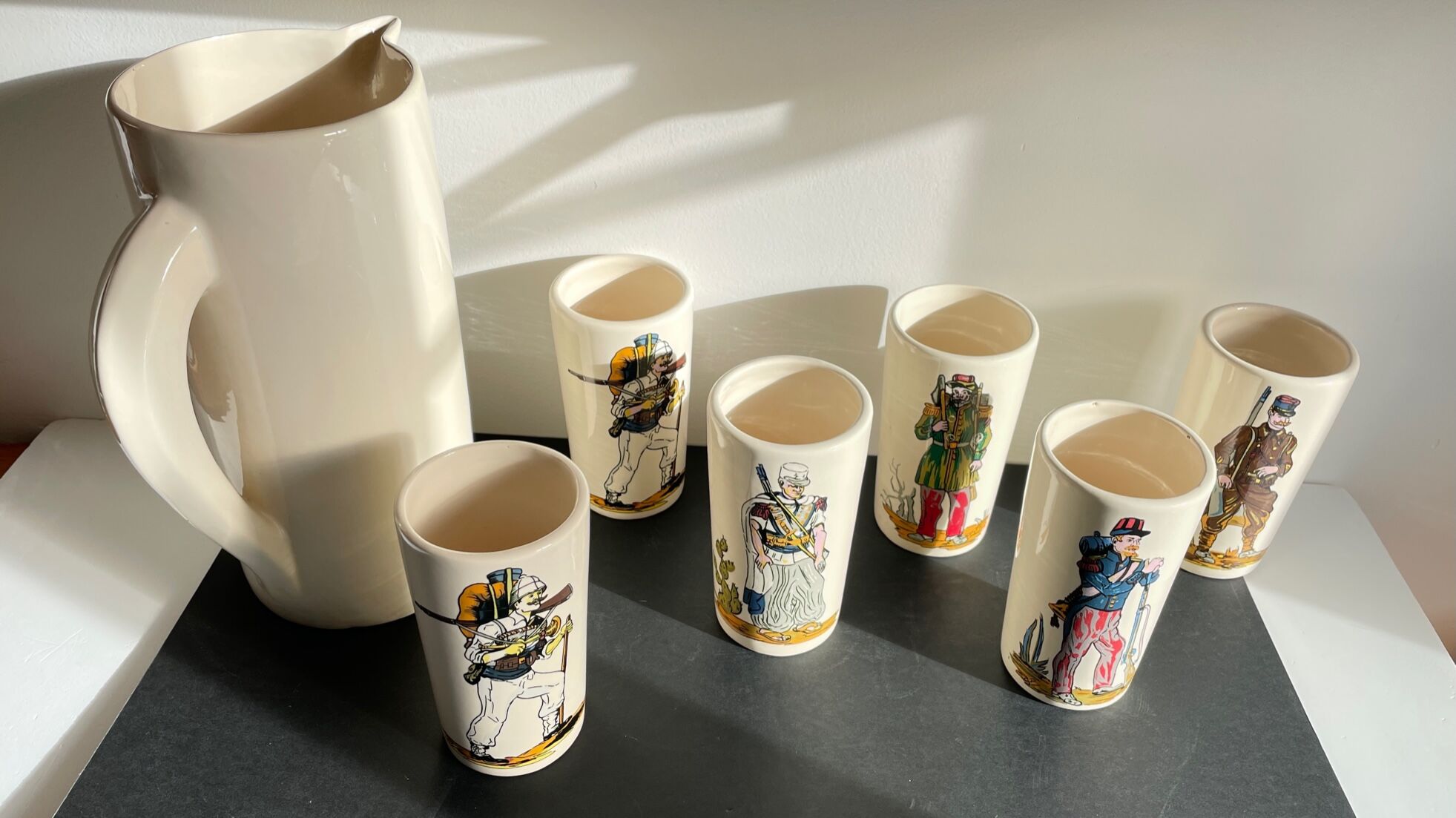 Orangeade service to vintage ceramic soldiers