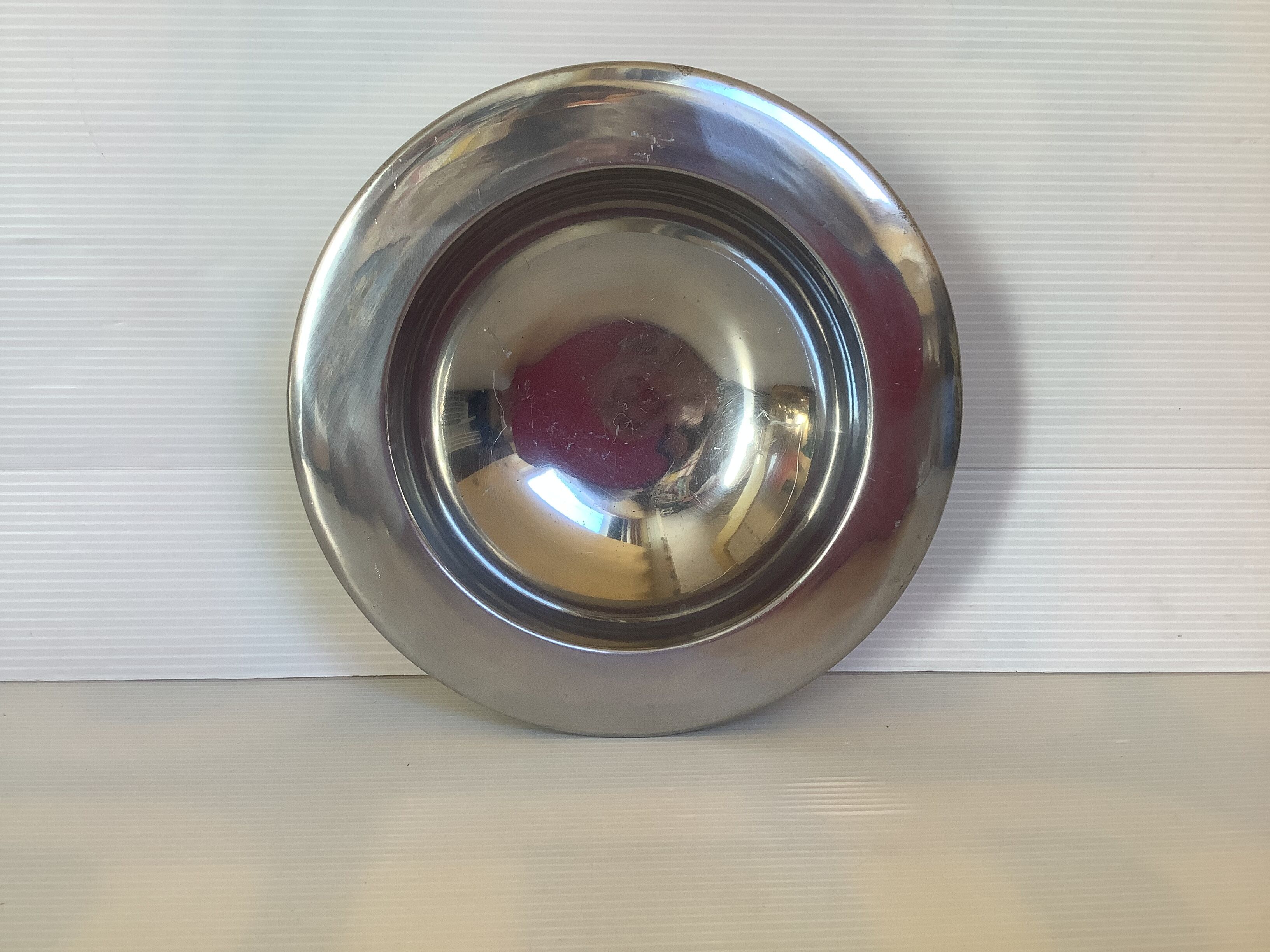 Empty chrome metal pocket