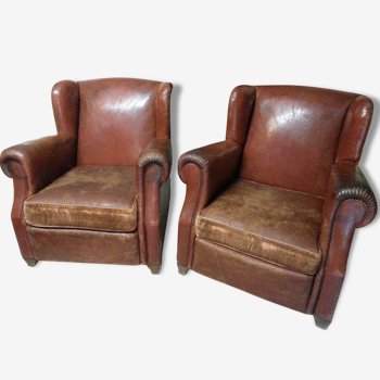 Pair of club chairs with ears, original leather