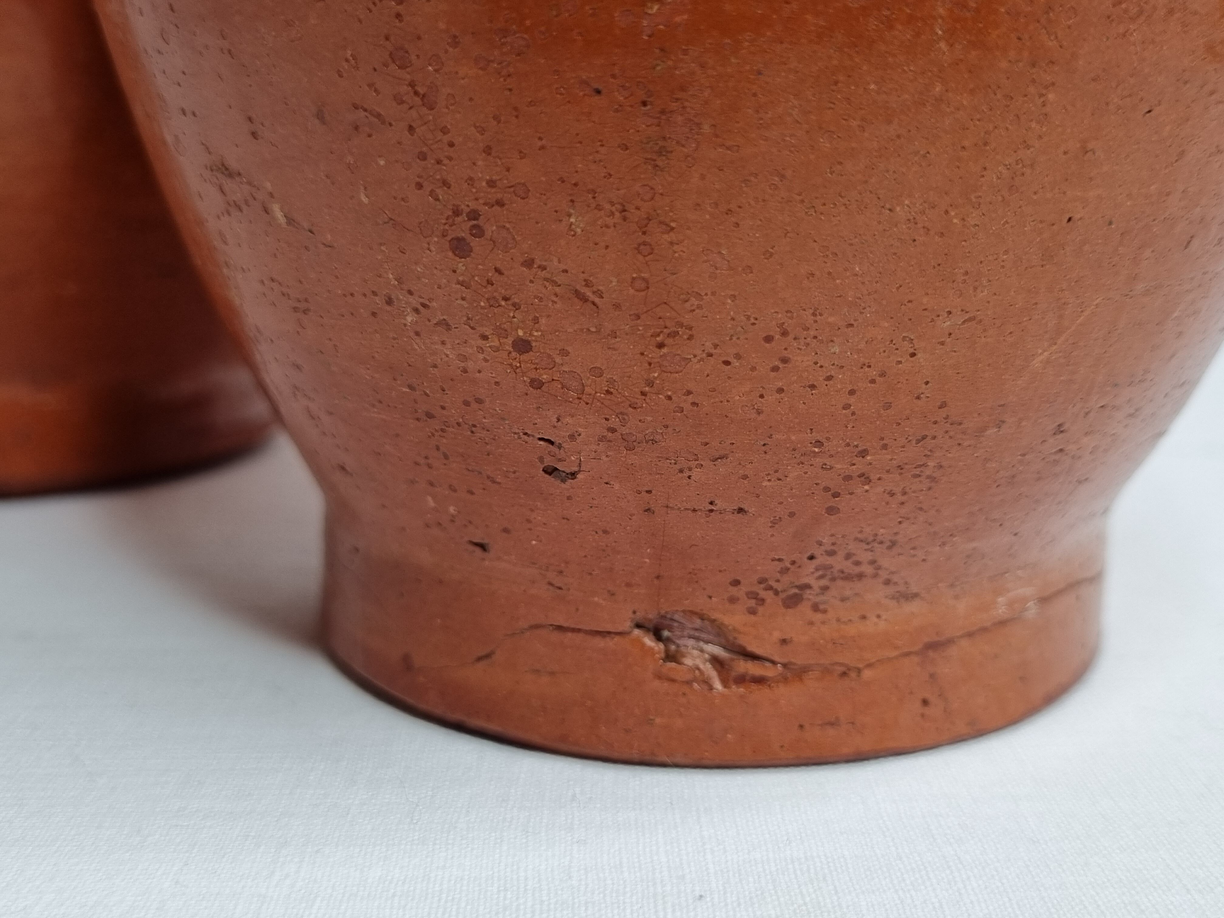 Pair of glazed terracotta jars, 26 cm