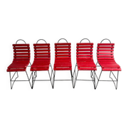 Red slatted chair with a black metal frame.