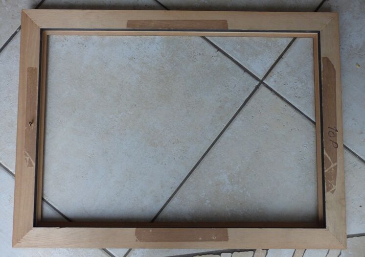 Wooden frame of black and gold color 63x46 cm