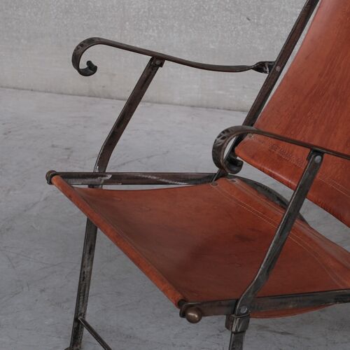 Pair of mid-century leather and metal folding armchairs