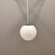 White hanging lamp with metal suspension, made with ball round opal glass shade.