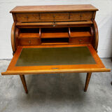Cylinder desk with marquetry featuring a crosshatch design.