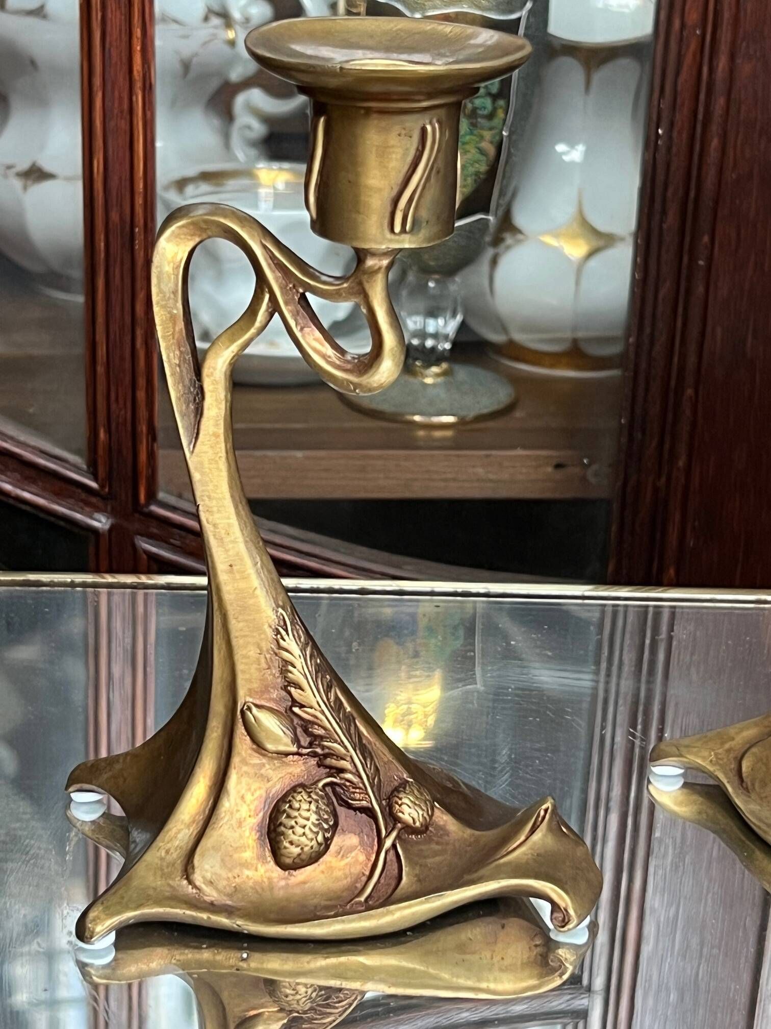 Pair of Art Nouveau style candlesticks. Solid bronze.