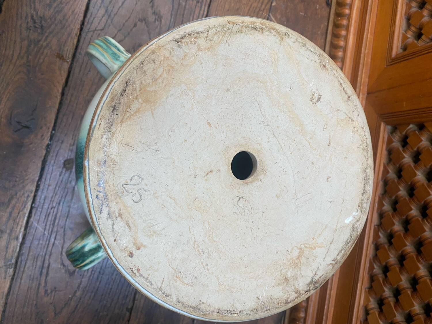 Old glazed terracotta pot cover