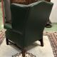 In the 1970s green leather Chesterfield armchair