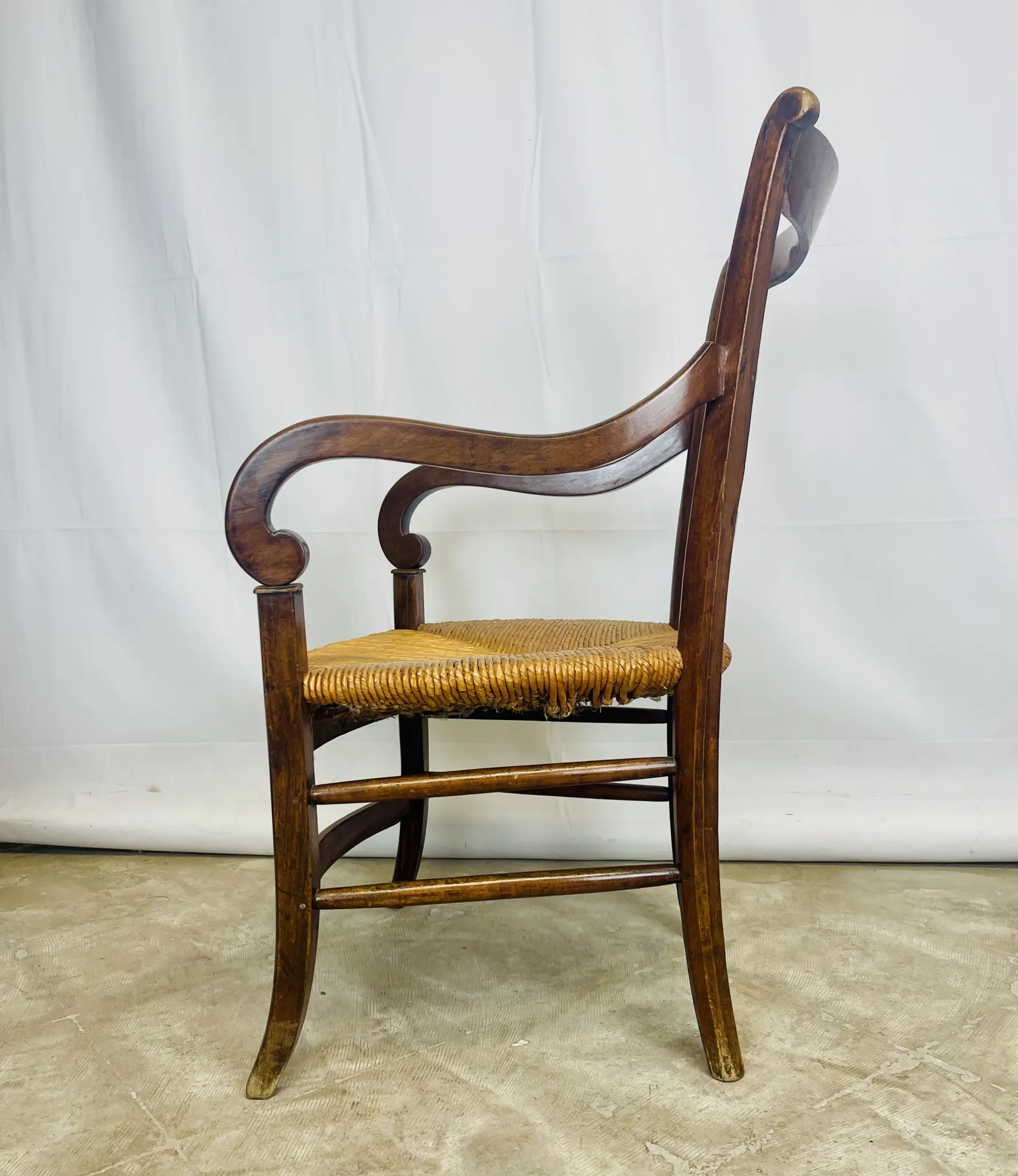 Pair of dissimilar walnut armchairs