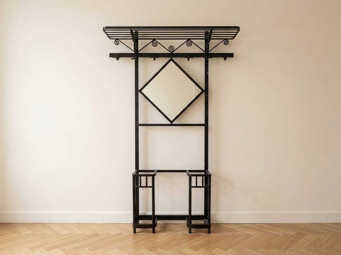 Antique black wrought iron coat rack with mirror.