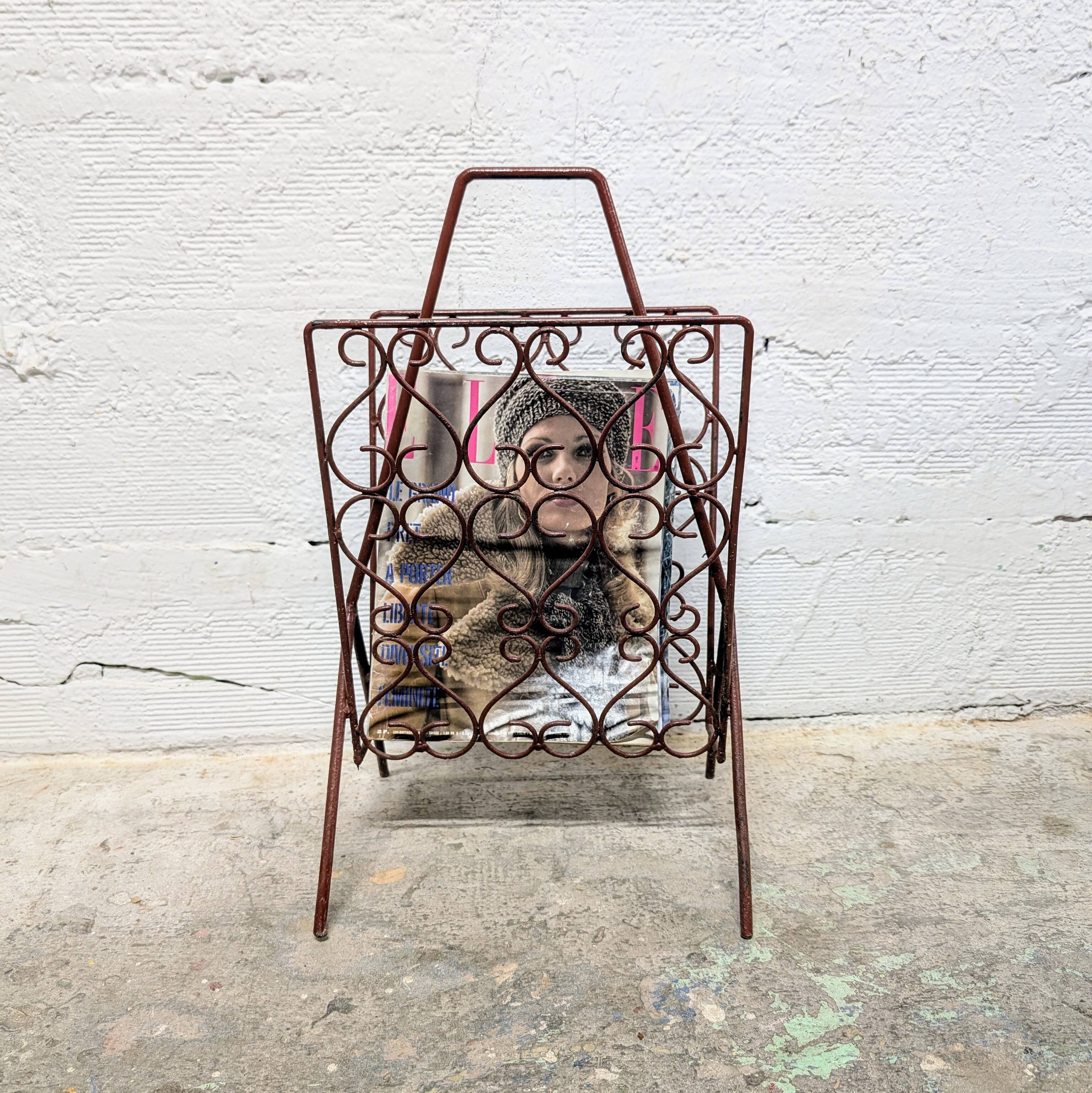 Vintage wrought iron magazine rack