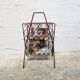 Vintage wrought iron magazine rack