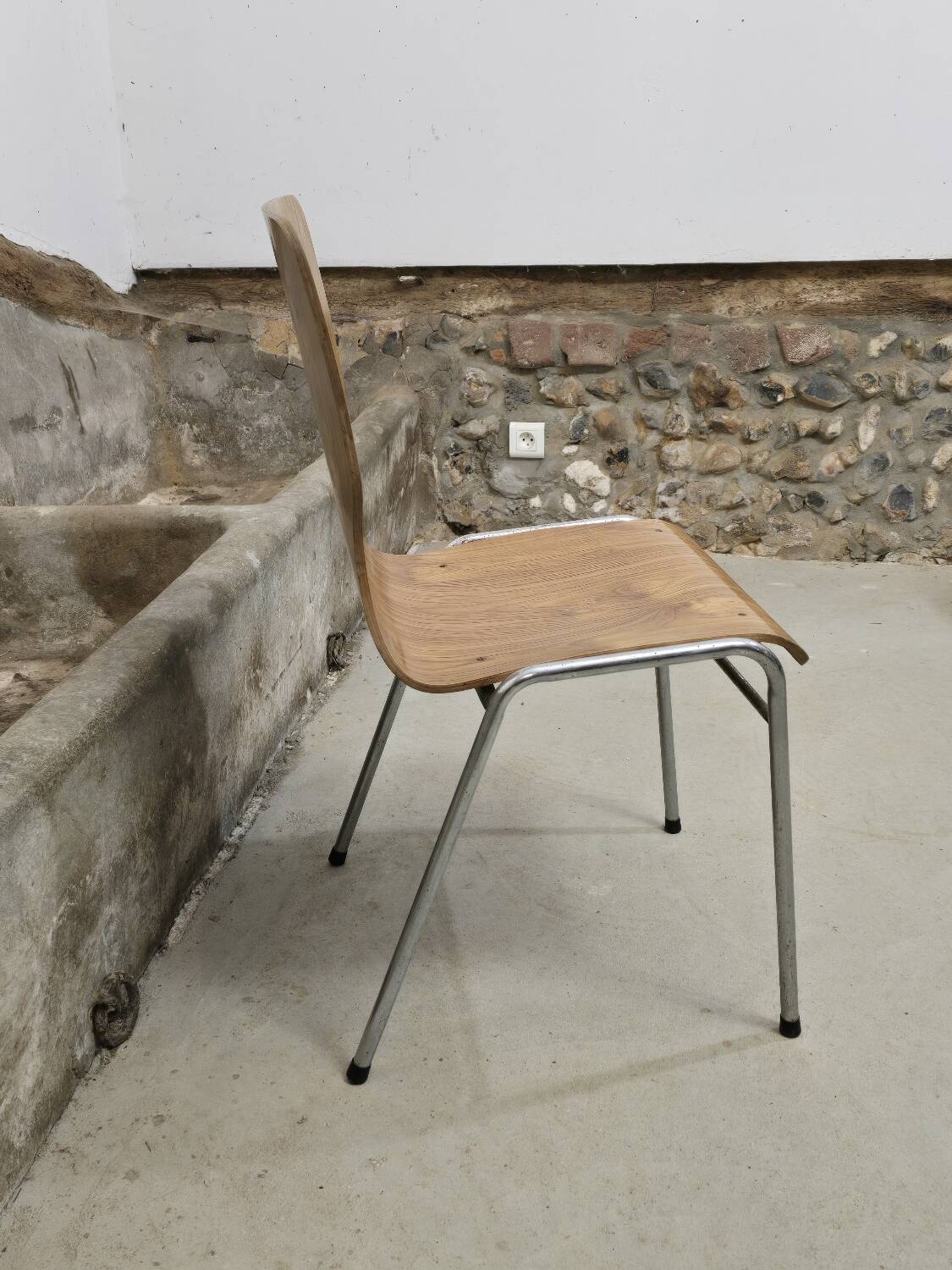 1960s chair in curved plywood on stainless steel base