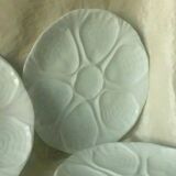 White porcelain oyster plates