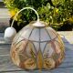 Suspension nacre et laiton papillons
