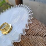 Serrated opaline suspension