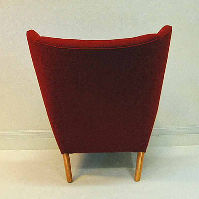 Red and massive Wingback armchair from around 1950`s, Scandinavian