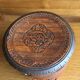 Round carved wooden box