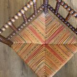 Corner armchair in beaded wood straw