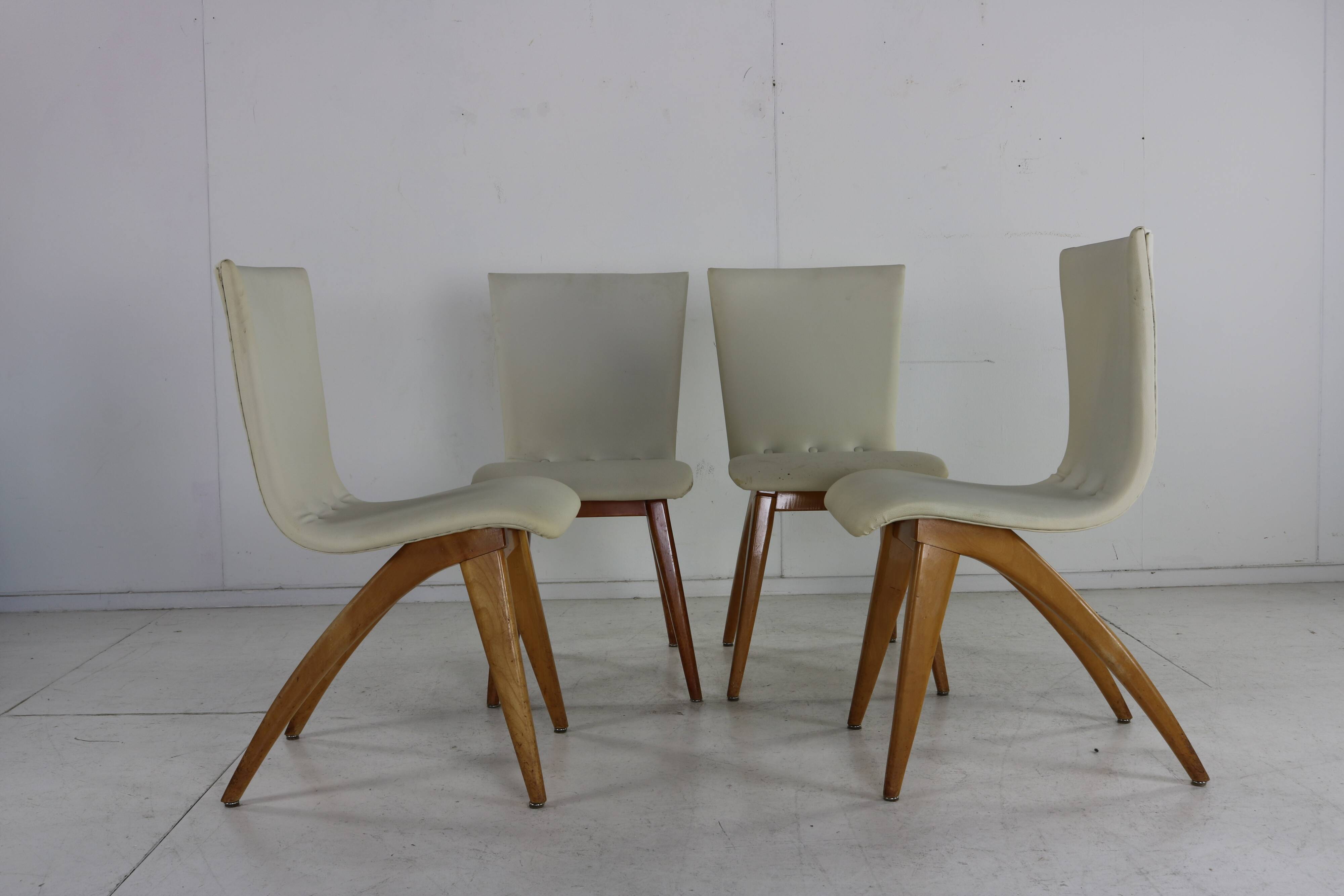 Set of four organic design dining chairs by G.J van Os