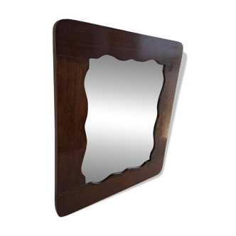 Czechoslovakian wall mirror with a wavy wooden frame, mid-century, 1940s