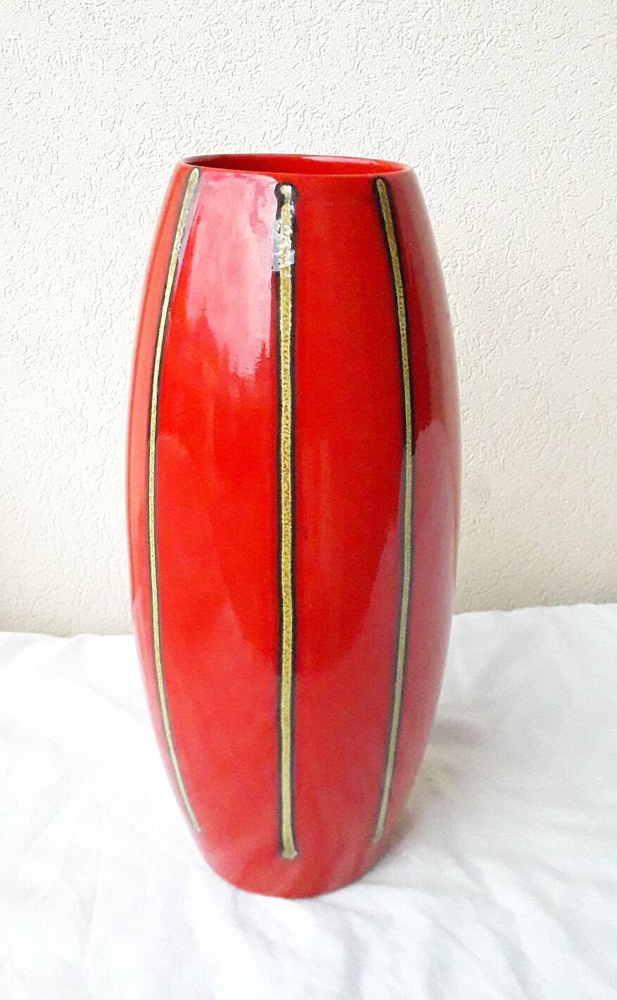Red ceramic vase
