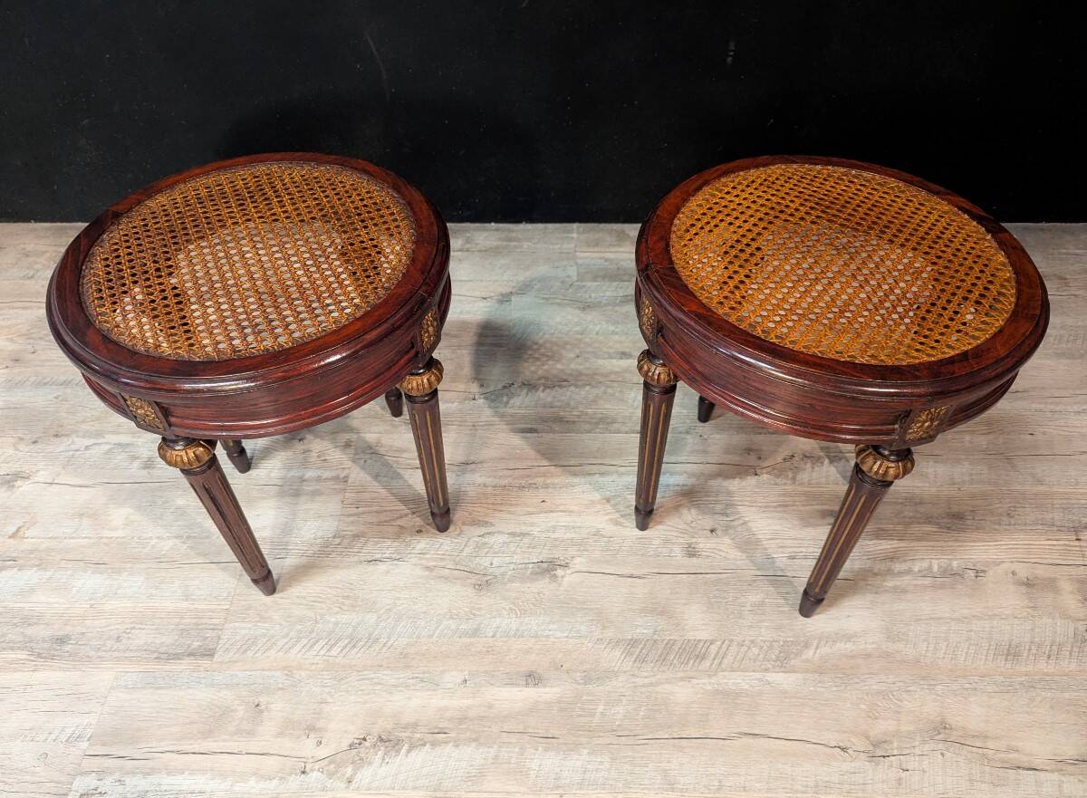 Pair of Louis XVI style stools with caned seats.