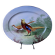 Antique large oval Limoges porcelain dish with painted pheasant decoration.