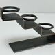 Sculptural candle holder patinated steel design 80s