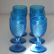Old table set in blue pressed moulded glass