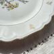 Vintage Limoges Berry porcelain cake dish with bird of paradise motif -