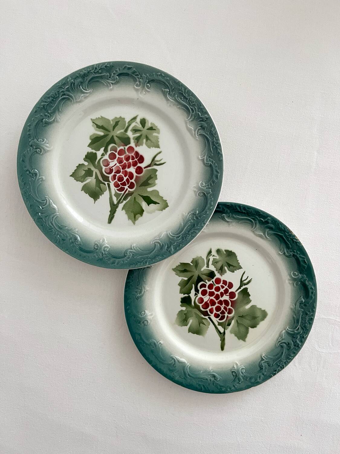 2 antique Pexonne earthenware dessert plates with grapes