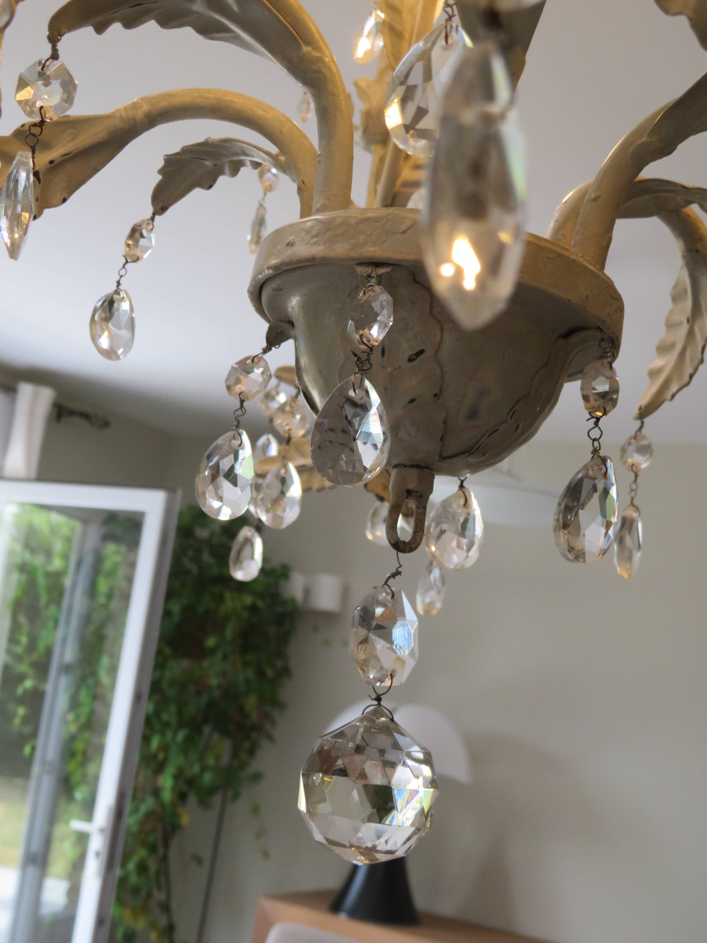 Large cage chandelier in aged metal.