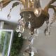 Large cage chandelier in aged metal.