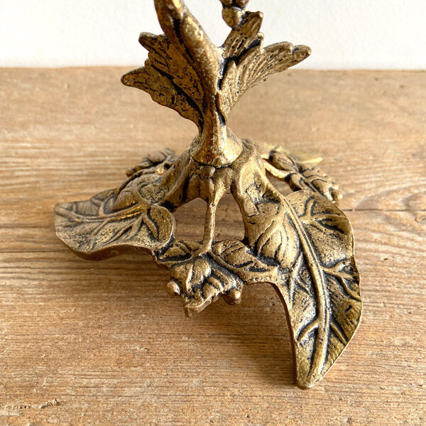 Candlestick in gilt bronze decorated with leaves