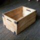 Wooden crate with metal fittings