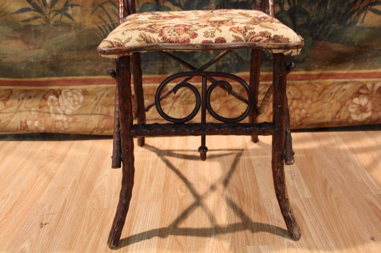 Folk art chair, black forest in branches