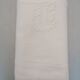 Antique white flat sheet embroidered with “AG”