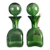Two green glass decanters