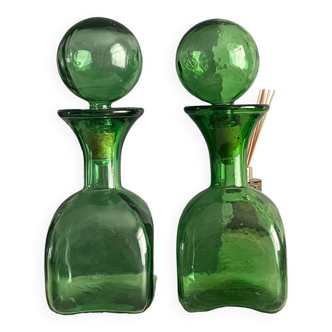 Two green glass decanters