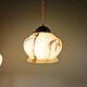 Trio of Art Deco marbled opaline pendant lights, 1920-30