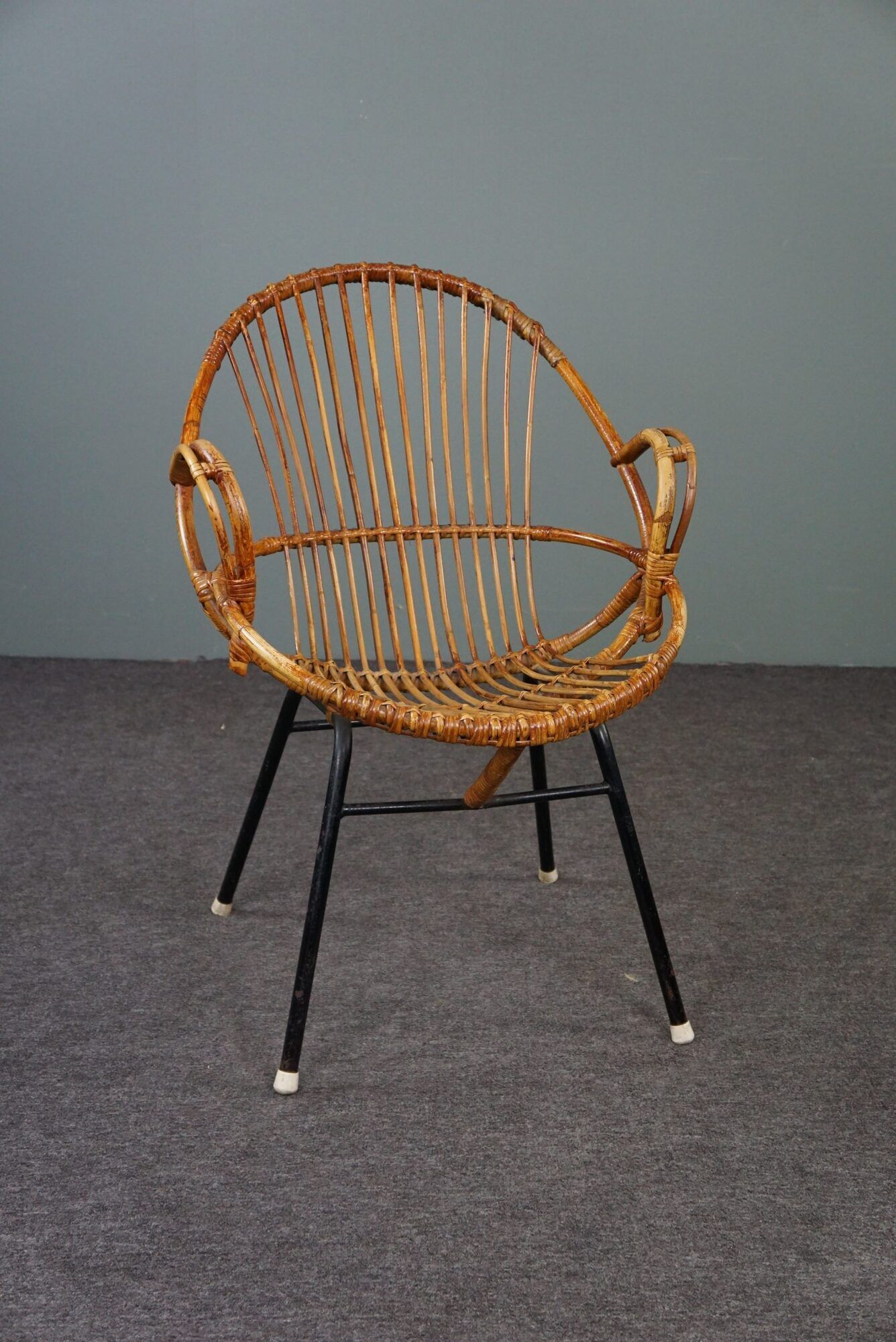 Dark rattan armchair with armrests Dutch Design 1960