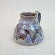 signed blue purple enamel ceramic pitcher