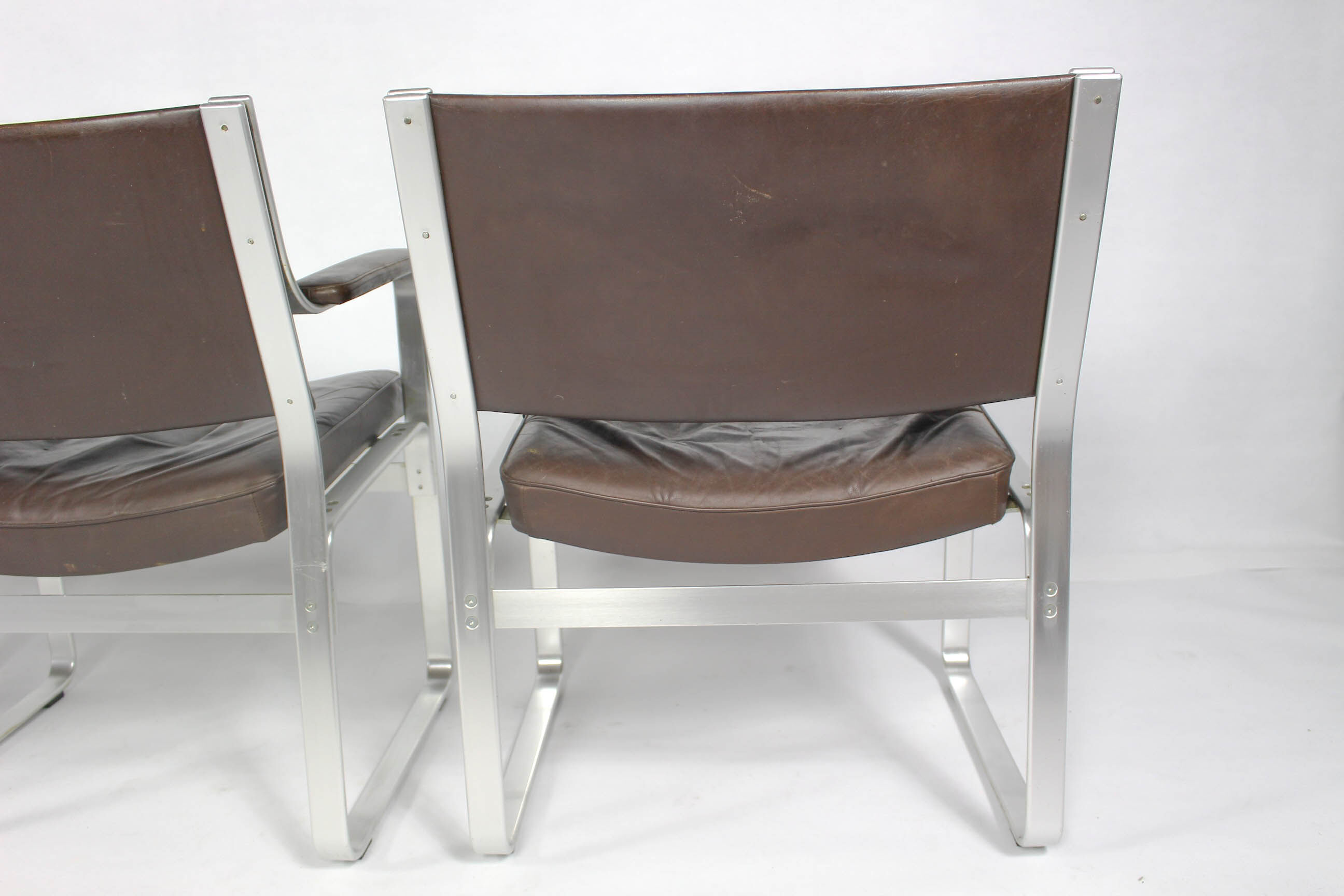 Swedish Mid Century Leather And Aluminum Armchairs By Karl Erik Ekselius For Joc Vetlanda, Set Of 4