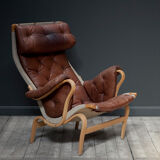 A Pernilla 69 leather lounge chair by Bruno Mathsson for Dux, 1969