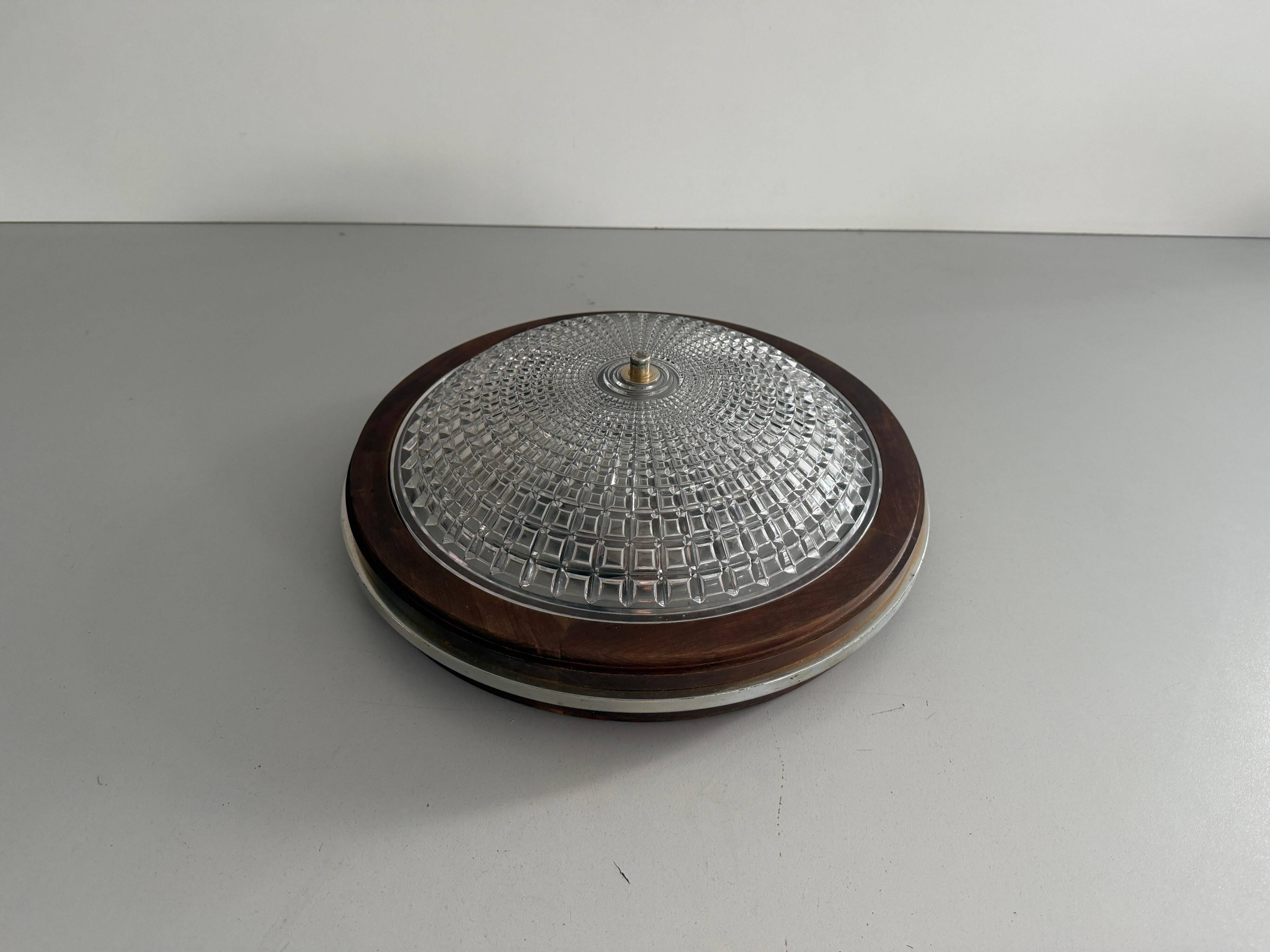 Flush mount in glass crystal and mahogany wood base, 1960s, Switzerland
